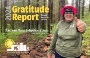 Cover of SAIL's 2024 Gratitude Report with an image of a young person wearing work clothes and a hardhat. They are making the thumbs up sign. The text reads 2024 Gratitude Report, annual report to donors. Southeast Alaska Independent Living July 1, 2023 to June 30, 2024.